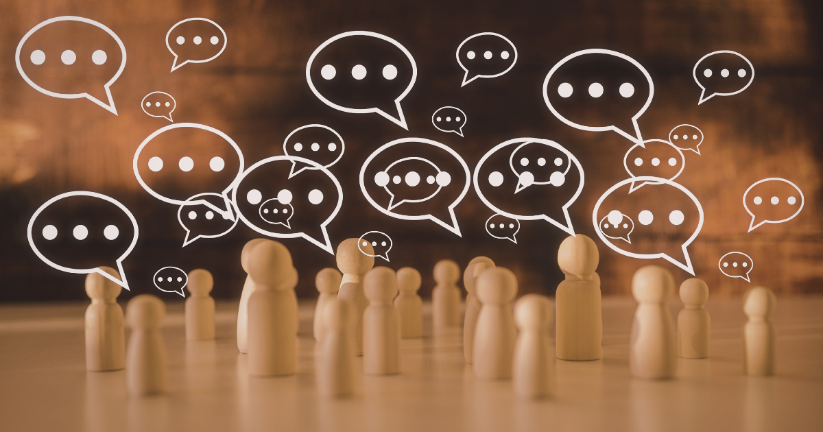 Wooden peg figures with speech bubble icons representing TikTok comment engagement and audience interaction